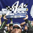 Kyle Busch holds up the trophy after winning the NASCAR Sprint Cup Series auto race at Michigan International Speedway in Brooklyn, Mich., Sunday, Aug. 21, 2011. (AP Photo/Bob Brodbeck)