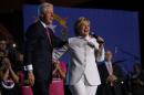 Democratic presidential nominee Hillary Clinton and her husband former U.S. President Bill Clinton speak during a debate watch party at Craig Ranch Regional Amphitheater following the third U.S. presidential debate at UNLV on October 19, 2016