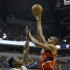Atlanta Hawks' Al Horford (15) shoots against Indiana Pacers' Ian Mahinmi (28) during the first half of Game 5 in the first round of the NBA basketball playoff series on Wednesday, May 1, 2013, in Indianapolis. (AP Photo/Darron Cummings)