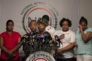 Gwen Carr, mother of Eric Garner, speaks during a news conference at the National Action Network in New York