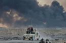 An Iraqi army vehicle is seen during an operation to attack Islamic State militants in Mosul, in Qayyara