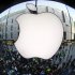 Customers gather outside an Apple store before the release of iPhone 5 in Munich