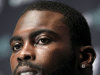 Philadelphia Eagles quarterback Michael Vick looks on during a news conference about his new contract with the NFL football team, Tuesday, Aug. 30, 2011 in Philadelphia. (AP Photo/Alex Brandon)