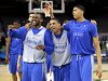Kentucky guard Darius Miller, left, Kentucky guard Twany Beckham, and forward Anthony Davis, right laugh during a practice session for the NCAA Final Four basketball tournament Friday, March 30, 2012, in New Orleans. Kentucky plays Louisville in a semifinal game on Saturday. (AP Photo/Mark Humphrey)