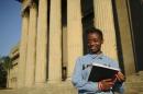 Second-year civil engineering student and first-time voter Nkululeko Simelane poses for a picture at Wits University in Johannesburg