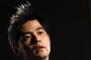 In this Dec. 1, 2011 image, Taiwan pop king Jay Chou speaks during an interview in his studio in Taipei, Taiwan. Chou stepped up his fight with paparazzi, calling them 
