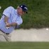 Russ Cochran hits out of a bunker on the ninth hole during the second round of the 74th Senior PGA Championship golf tournament at Bellerive Country Club Friday, May 24, 2013, in St. Louis. (AP Photo/Jeff Roberson)