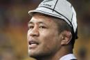 All Blacks' Mealamu wears a cap signifying his 100th test match for New Zealand after their Bledisloe Cup rugby union test match against Wallabies in Brisbane