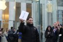 The first customer to purchase the new iPad at the 5th Ave. Apple store
