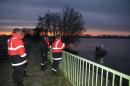 Firefighters near the Dordogne river, on December 21, 2013 in Lugon-et-l'Ile-du-Carnay, southwestern France, after a helicopter carrying a Chinese tycoon overflying his newly-purchased vineyard went down the day before