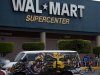 A van covered by a mural sits parked outside a Walt-Mart Super Center in Mexico City, Saturday, April 21, 2012.  Wal-Mart Stores Inc. hushed up a vast bribery campaign that top executives of its Mexican subsidiary carried out to build stores across Mexico, according to a published report by the New York Times. Wal-Mart is Mexico's largest private employer. (AP Photo/Dieu Nalio Chery)