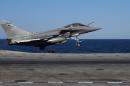A French Rafale fighter aircraft carrying bombs is catapulted off aircraft carrier Charles-de-Gaulle at eastern Mediterranean Sea, as part of operation Chammal in Syria and Iraq against the Islamic State (IS) group on November 23, 2015
