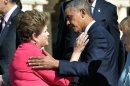 US President Barack Obama greets Brazil leader Dilma Rousseff at the G20 summit, September 6, 2013, Saint Petersburg