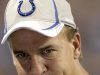 FILE - In this  Aug. 26, 2011, file photo, Indianapolis Colts quarterback Peyton Manning looks on from the sideline during the third quarter of an NFL preseason football game against the Green Bay Packers in Indianapolis. Manning will not play Sunday, Sept. 11, 2011, in the season opener at Houston, bringing an end to his streak of 227 consecutive starts, including the playoffs. The team said 38-year-old Kerry Collins will start against the Texans as Manning continues his long recovery from neck surgery in May.(AP Photo/AJ Mast, File)
