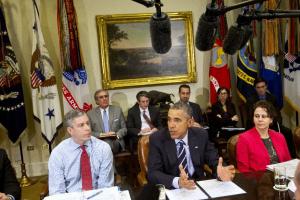 President Barack Obama, flanked by Education Secretary&nbsp;&hellip;
