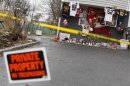 A makeshift memorial for Kansas City Chiefs football player Jovan Belcher is seen outside his mothers home in West Babylon, New York