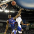 Kansas forward Thomas Robinson (0) and Kentucky guard Darius Miller (1) battle for the ball during the first half of the NCAA Final Four tournament college basketball championship game Monday, April 2, 2012, in New Orleans. (AP Photo/David J. Phillip)