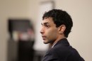 Dharun Ravi sits in the courtroom during his trial at the Middlesex County Courthouse in New Brunswick, N.J., Monday, March 5, 2012. Ravi is accused of using a webcam to spy on his roommate, Tyler Clementi, having an intimate encounter with another man. Days later Clementi committed suicide. Ravi, 19, faces 15 criminal charges, including invasion of privacy and bias intimidation, a hate crime punishable by up to 10 years in state prison. (AP Photo/The Star-Ledger, John O'Boyle, Pool)