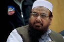 FILE - In this April 11, 2011 file photo, Lashkar-e-Taiba founder Hafiz Saeed, attends a ceremony in Islamabad, Pakistan. The United States has offered a $10 million bounty for the founder of the Pakistani militant group blamed for the 2008 attacks in the Indian city of Mumbai that killed 166 people. (AP Photo/Anjum Naveed,File)