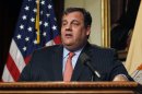 In this Friday, Dec. 7, 2012 photograph, New Jersey Gov. Chris Christie reacts to a question during a news conference in Trenton, N.J. The Republican governor was asked about his weight problem during an interview with Barbara Walters for her 