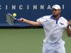 Roddick of the U.S. hits a return to Chardy of France during their first round match in the 2012 Cincinnati Open tennis tournament in Cincinnati