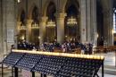 People atttend a mass in the Notre-Dame de Paris cathedral on November 29, 2012, in Paris