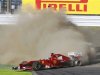 Ferrari Formula One driver Alonso loses control of his car in the first corner of the Japanese F1 Grand Prix at the Suzuka circuit