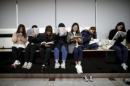 Students majoring in nursing prepare for their final exam at Bucheon University in Bucheon, South Korea