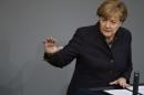 German Chancellor Merkel addresses a session of the German lower house of parliament, the Bundestag, in Berlin