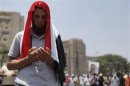 Members of the Muslim Brotherhood and supporters of deposed Egyptian President Mohamed Mursi perform afternoon prayers at the Rabaa Adawiya square, where they are camping, in Cairo