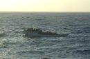 This June 27, 2012 photo released by Australian Maritime Safety Authority shows a boat carrying asylum seekers 200 kilometers (120 miles) north of Christmas Island in the Indian Ocean hours before capsizing Wednesday, June 27, 2012. The boat capsized Wednesday and 123 people were rescued from the ocean, Prime Minister Julia Gillard said, less than a week after more than 90 people drowned on a similar journey. (AP Photo/Australian Maritime Safety Authority)