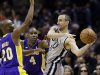 San Antonio Spurs' Manu Ginobili, right, of Argentina, is pressured by Los Angeles Lakers' Jodie Meeks (20) and Antawn Jamison (4) during the first half of Game 1 of their first-round NBA playoff basketball series, Sunday, April 21, 2013, in San Antonio. (AP Photo/Eric Gay)