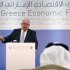 Greek Deputy Prime Minister Theodoros Pangalos speaks during a business forum in front of United Arab Emirates Foreign Minister Sheikh Abdullah bin Zayed Al Nahyan in the Lagonissi resort south of Athens, on Wednesday, Jan.11, 2012. Debt-crippled Greece is seeking to boost investment from the United  Arab Emirates, and officials from both countries expressed interest in boosting economic ties. (AP Photo/Petros Giannakouris)