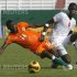 Ngossan Antoine Jean Ettien of Ivory Coast tackles Badian Vito of Senegal during the African Nations championship soccer tournament in Abidjan