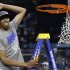 Kentucky forward Anthony Davis celebrates as he cuts the net after the NCAA Final Four tournament college basketball championship game Monday, April 2, 2012, in New Orleans.  Kentucky beat Kansas 67-59.  (AP Photo/David J. Phillip)