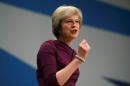 Britain's Prime Minister Theresa May gives her speech on the final day of the annual Conservative Party Conference in Birmingham