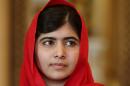 Malala Yousafzai looks on during a Reception for Youth, Education and the Commonwealth at Buckingham Palace in London on October 18, 2013