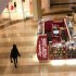 A woman walks through a shopping mall in San Francisco