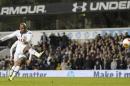 Tottenham Hotspur's English striker Jermain Defoe scores from the penalty spot at White Hart Lane in London, on November 7, 2013