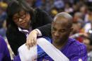 Los Angeles Lakers' Kobe Bryant has his right shoulder wrapped on the bench during the first half of the team's NBA basketball game against the Golden State Warriors on Thursday, Jan. 14, 2016, in Oakland, Calif. (AP Photo/Ben Margot)