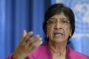 UN High Commissioner for Human Rights, South African Navi Pillay, answers journalist's questions about the human rights situation in the world, during a press conference at the Geneva Press Club, in Geneva, Switzerland, Thursday, July 31, 2014. (AP Photo/Keystone, Martial Trezzini)