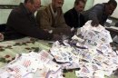 Officials count ballots after polls closed in Bani Sweif