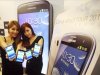 In this photo released by Samsung Electronics Co., models pose with Samsung Electronics' newest smartphone Galaxy S III during its world tour in Seoul, South Korea, Monday, June 25, 2012. Samsung Electronics, the world's top mobile phone maker, said Monday it expects global sales of the latest Galaxy smartphone to surpass 10 million in July even as it struggles to keep up with demand because of component shortages. (AP Photo/Samsung Electronics) NO SALES