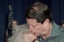 FILE - In this Sept. 27, 2000, file photo Democratic presidential candidate Vice President Al Gore kisses Iowa retiree Winifred Skinner, 79, after listening to her talk about how she struggles with the high costs of prescriptions, as Gore spoke on his Medicare agenda at a community center in Altoona, Iowa. Wanna be famous? Forget reality TV. The presidential campaign could be just the ticket from nowhere to notoriety. It can be done with a heartfelt story. An off-hand remark. Or simply by having a distant connection to someone who's Somebody. Skinner told Gore she collects discarded cans to supplement her pension. (AP Photo/ J. Scott Applewhite, File)