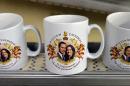Mugs celebrating the birth of Princess Charlotte of Cambridge are pictured on a production line at the Prince William Pottery in Liverpool, England, on May 6, 2015