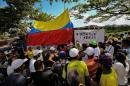 Relatives and friends of 28 missing gold miners block a key highway connecting Venezuela and Brazil to demand answers on what happened to their loved ones on March 8, 2016