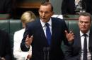 Australian PM Abbott speaks in the Australian Parliament in Canberra