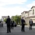 FILE - In this Monday, Oct. 24, 2011 file photo, Secret Service agents stand guard as President Barack Obama meets with the neighbors of homeowners Jose and Lissette Bonilla in Las Vegas. The Secret Service has been tarnished by a prostitution scandal that erupted April 13, 2012 in Colombia involving 12 Secret Service agents, officers and supervisors and 12 more enlisted military personnel ahead of President Barack Obama's visit there for the Summit of the Americas. (AP Photo/Susan Walsh)