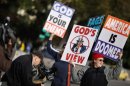 Members of the Westboro Baptist Church demonstrate outside the Supreme Court.