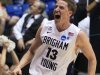 Brigham Young forward Brock Zylstra celebrates after he scored in the closing minute of BYU's 78-72 win over Iona in an NCAA men's college basketball tournament opening-round game, Tuesday, March 13, 2012, in Dayton, Ohio. (AP Photo/Al Behrman)